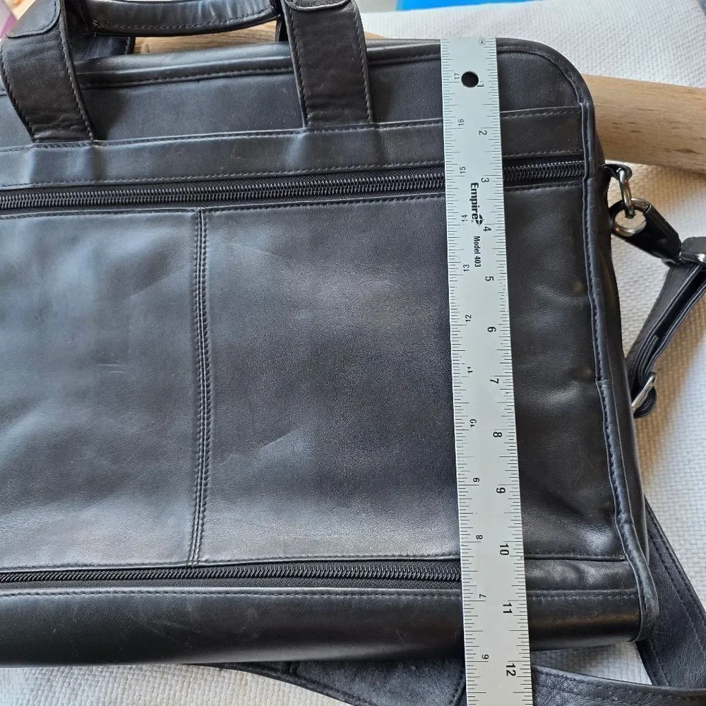 Tumi black leather briefcase